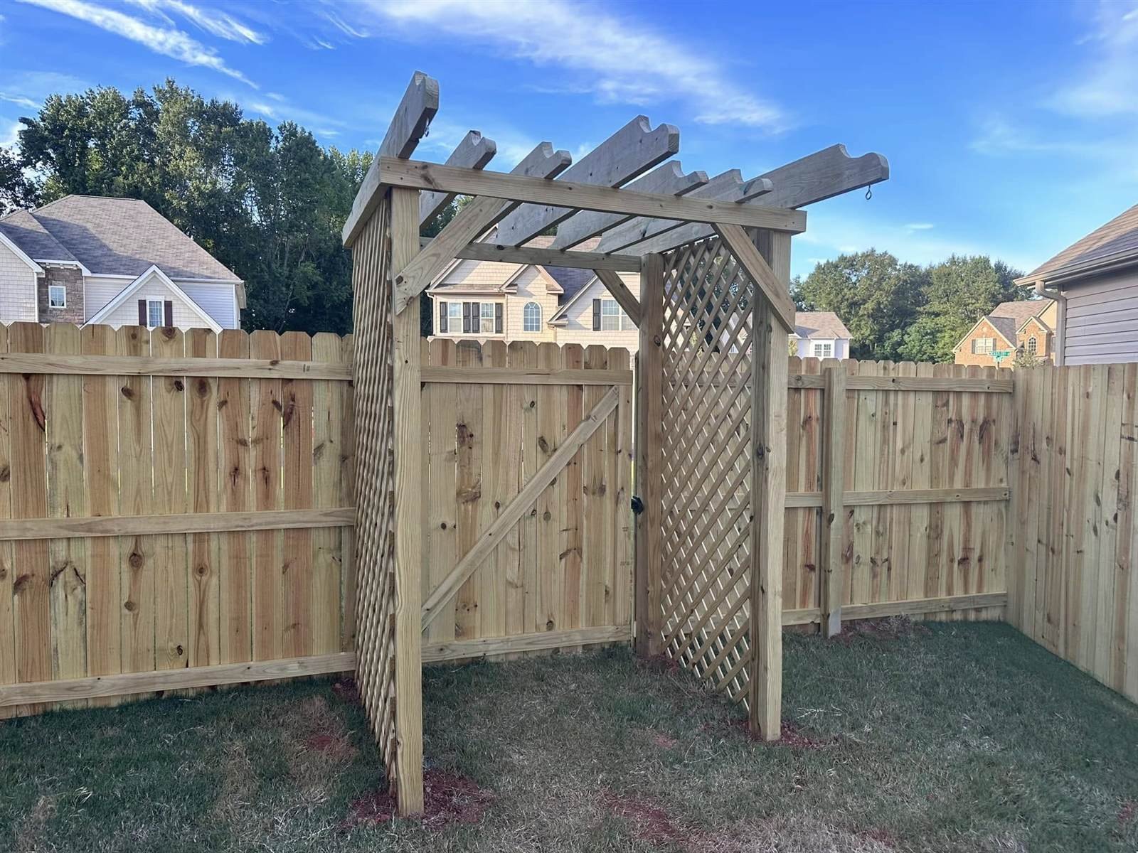 Cedar garden arbor with lattice gate