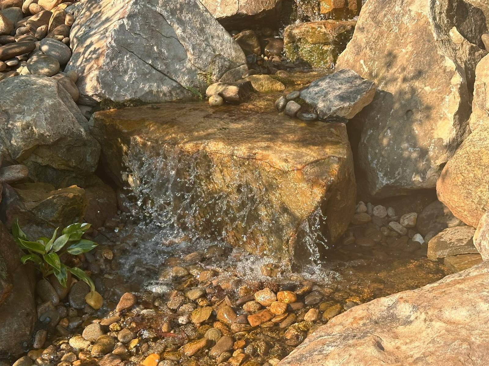 Close-up of a natural stone waterfall spillway
